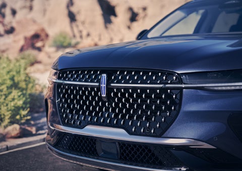 The stylish grille of a 2024 Lincoln Nautilus® SUV sparkles in the sunlight. | Vance Lincoln in Miami OK