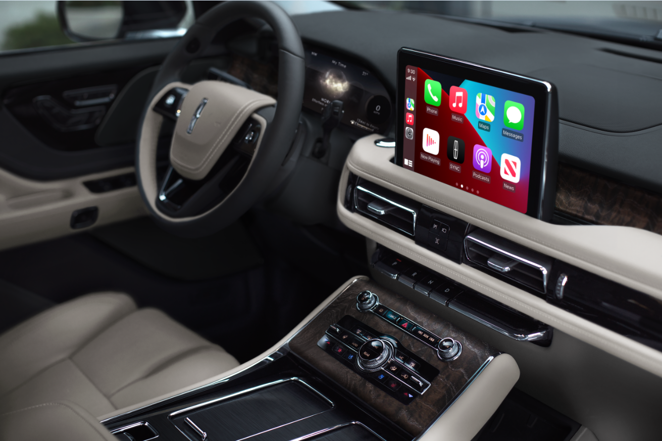 The interior of a Lincoln Aviator® SUV is shown with emphasis on the center touchscreen | Vance Lincoln in Miami OK
