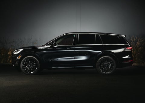 A 2024 Lincoln Aviator® SUV is shown in the Infinite Black exterior color | Vance Lincoln in Miami OK