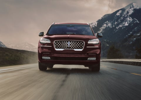 A 2024 Lincoln Aviator® SUV is shown in the Diamond Red exterior color. | Vance Lincoln in Miami OK