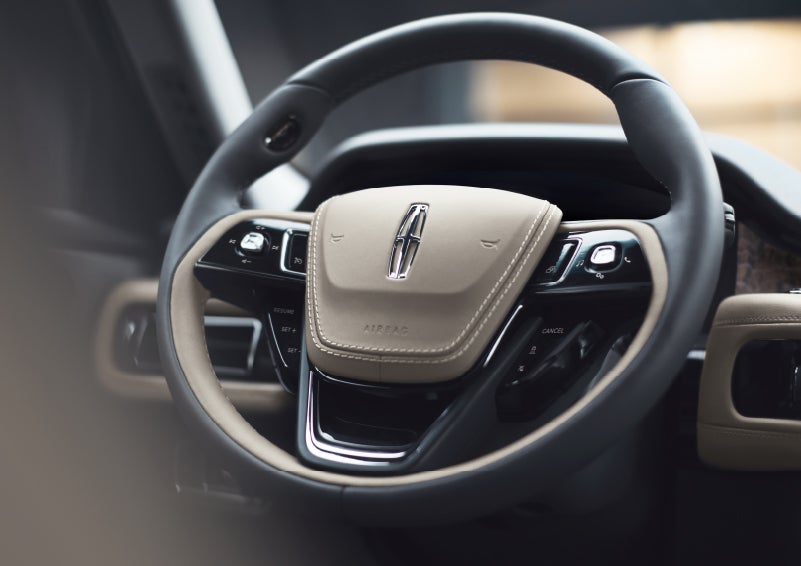 The intuitively placed controls of the steering wheel on a 2024 Lincoln Aviator® SUV | Vance Lincoln in Miami OK