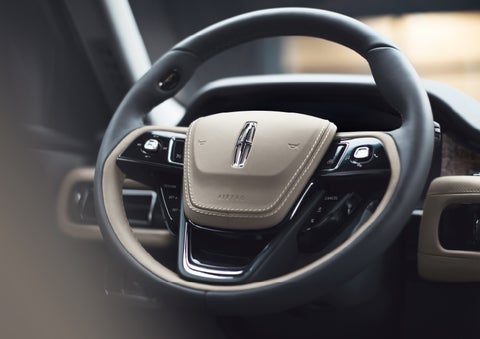 The intuitively placed controls of the steering wheel on a 2024 Lincoln Aviator® SUV | Vance Lincoln in Miami OK