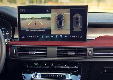 The driver of a 2024 Lincoln Corsair® SUV is shown selecting the drive mode. | Vance Lincoln in Miami OK