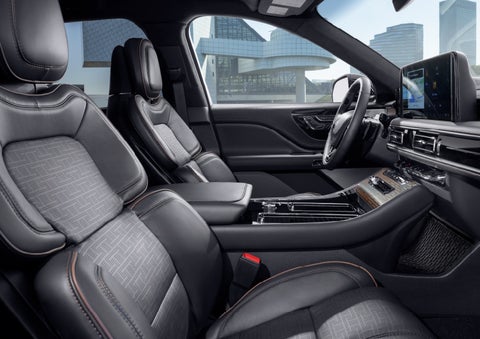 The interior of the 2025 Lincoln Aviator® SUV is shown with sleek black accents. | Vance Lincoln in Miami OK