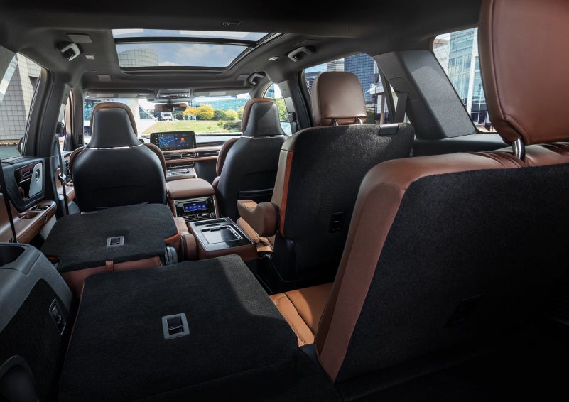 The interior of the 2025 Lincoln Aviator® SUV is shown with two seats folded down for added space. | Vance Lincoln in Miami OK