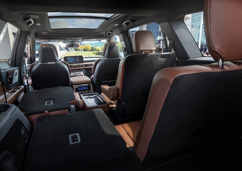 The interior of the 2025 Lincoln Aviator® SUV is shown with two seats folded down for added space. | Vance Lincoln in Miami OK