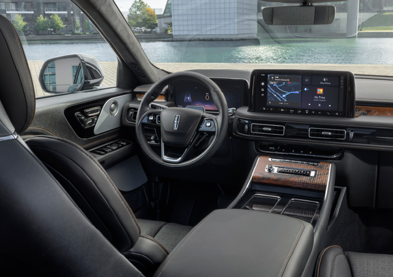 The interior of the 2025 Lincoln Aviator® SUV is shown parked with a view of a harbor through the windshield. | Vance Lincoln in Miami OK