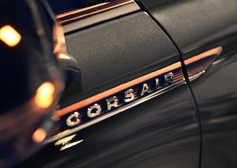 The stylish chrome badge reading “CORSAIR” is shown on the exterior of the vehicle. | Vance Lincoln in Miami OK