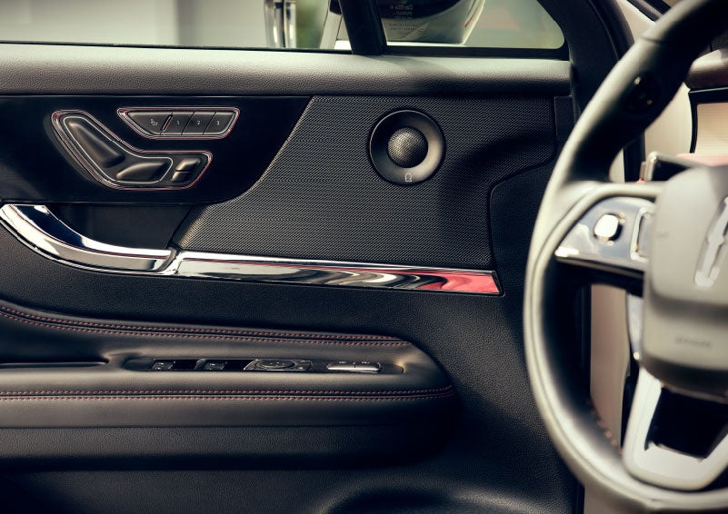 An audio speaker is shown in the driver's side door of a 2024 Lincoln Corsair® SUV. | Vance Lincoln in Miami OK