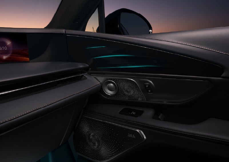 Selectable ambient lighting glows in the passenger door panel. | Vance Lincoln in Miami OK